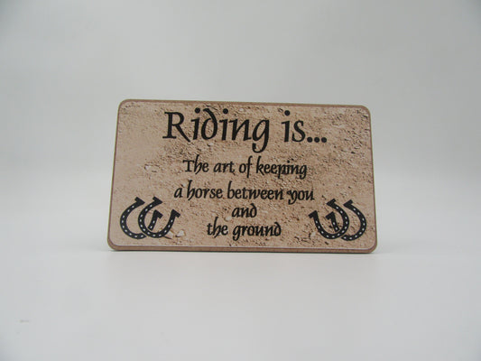 Magnet – Riding is… The art of keeping a horse between you and the ground Mooshimoo