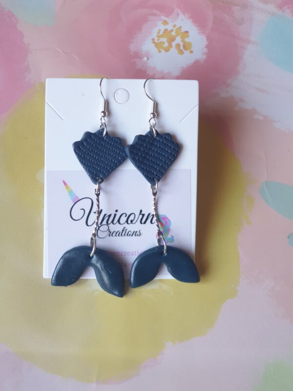 Blu whale tail earrings made with polymer clay