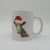 Mug with photo of giraffe wearing christmas hat